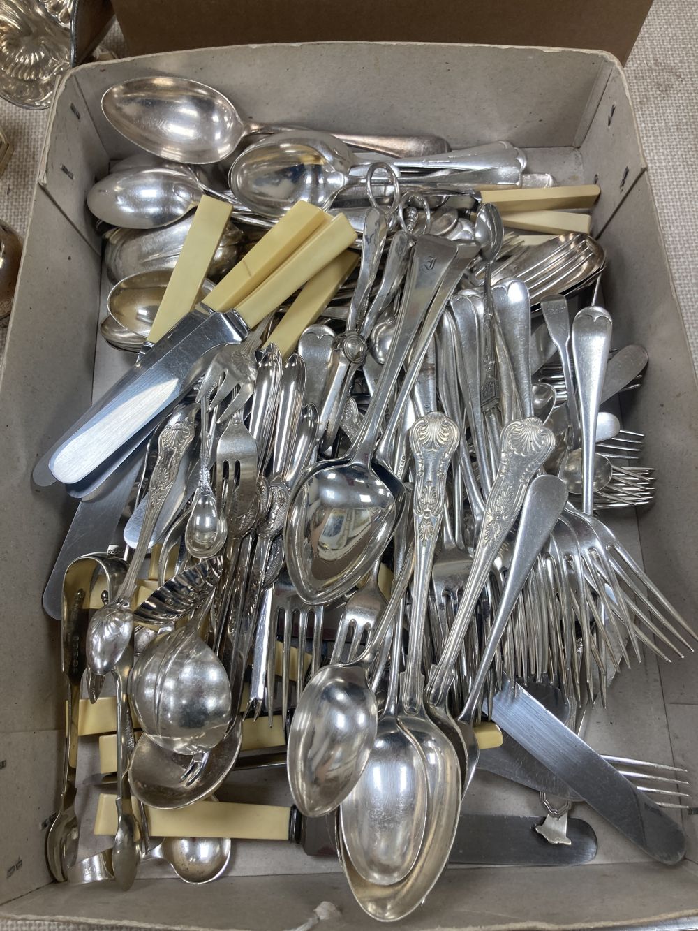 A Victorian silver plated four piece tea set, assorted plated flatware,etc.